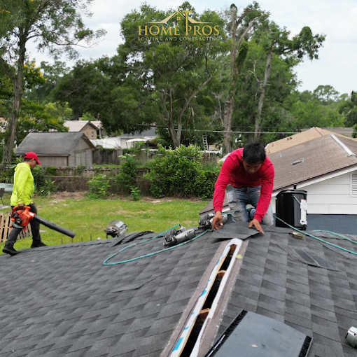 Professional roofing contractor performing roof repair on a residential home in Apopka, FL, ensuring high-quality workmanship and durability.