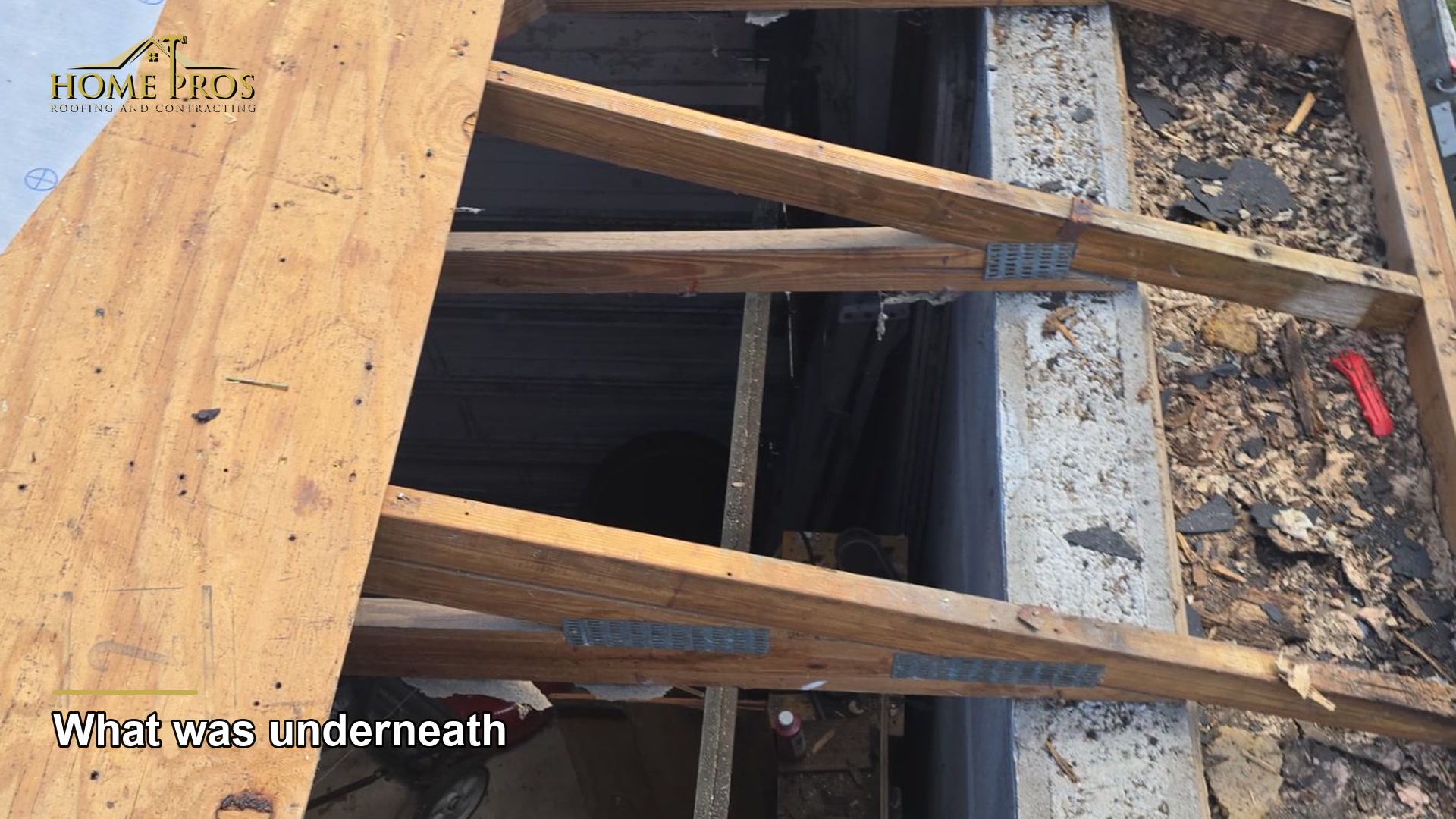 Exposed roof framing and damaged decking near the eaves of the Orlando project